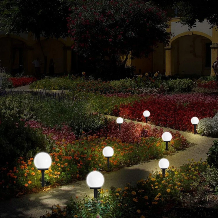 Elegant 3-pack waterproof solar LED sphere lights, ideal for illuminating gardens, paths & patios.