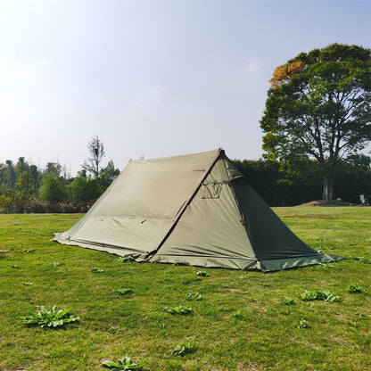 Tent entrance of the windproof 4-season tent with stove jack, open for ventilation.