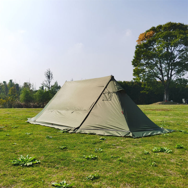Tent entrance of the windproof 4-season tent with stove jack, open for ventilation.