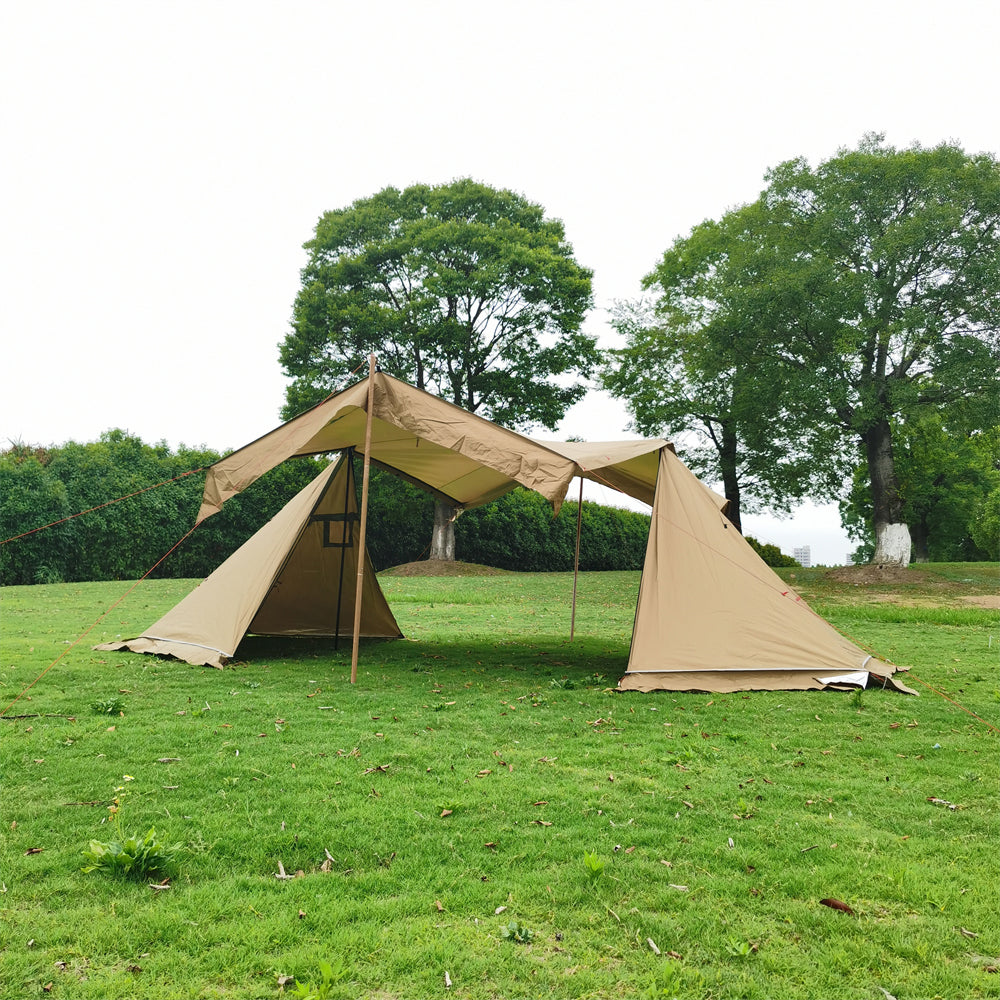 Durable 4-season camping tent pitched in a snowy landscape, showcasing windproof design.