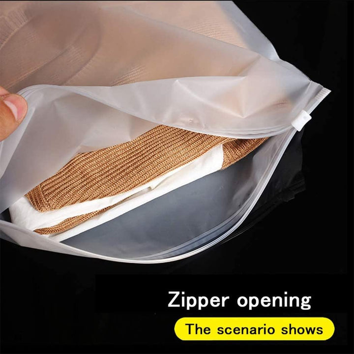 Resealable frosted packing bags with vent holes, 40-pack, for compressing & protecting clothes.