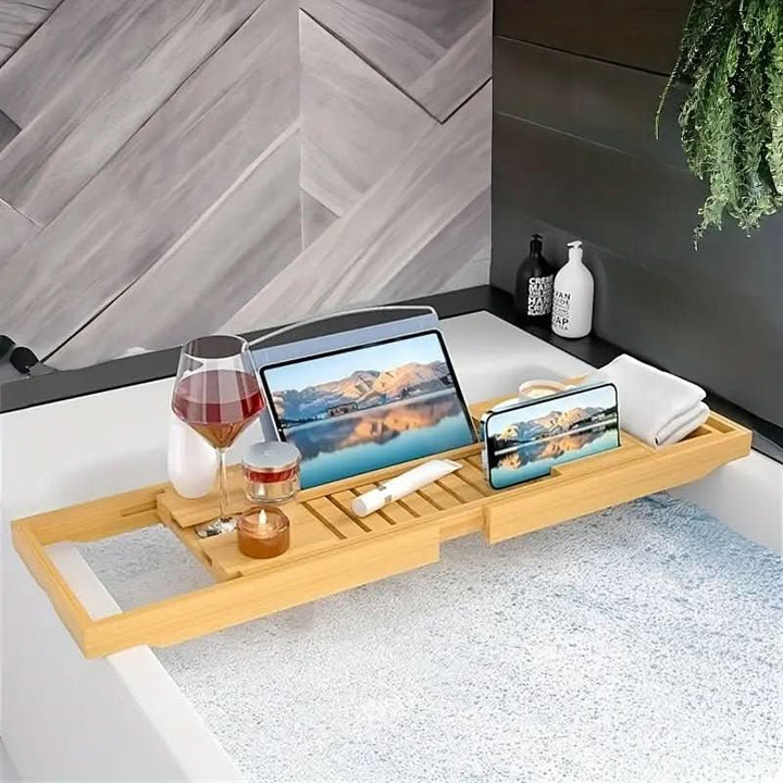 Unisex bamboo bathtub caddy, designed for holding a tablet, glass of wine, & candles during a warm, relaxing bath.