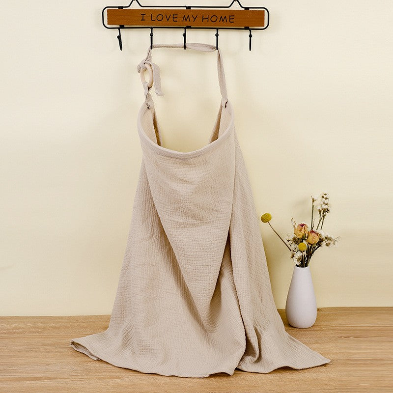 Soft cotton breastfeeding privacy cover, adjustable for comfortable, discreet infant feeding.