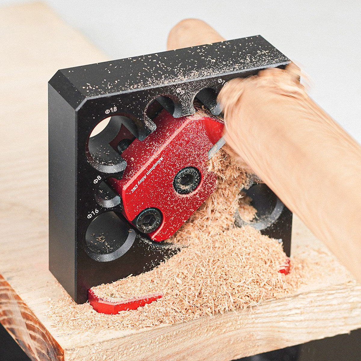 Precision woodworking tool: Electric drill attachment for shaping wood into round dowels.