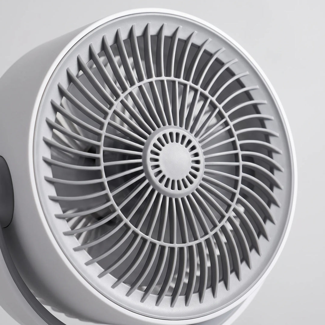 Modern adjustable pedestal fan with remote control and oscillation for comprehensive air circulation.