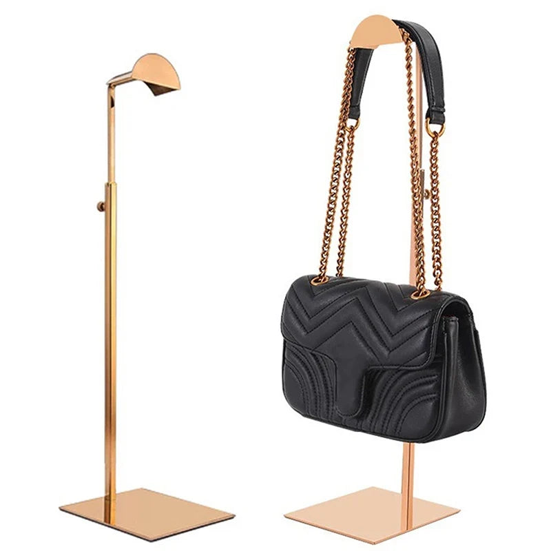 Adjustable metal handbag stand for retail displays or luxury home organization, perfect for purses & accessories.
