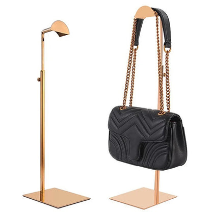 Adjustable metal handbag stand for retail displays or luxury home organization, perfect for purses & accessories.
