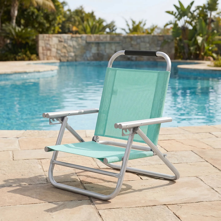 Adjustable portable beach chair, lightweight and foldable for easy transport. Perfect for summer outdoor relaxation.