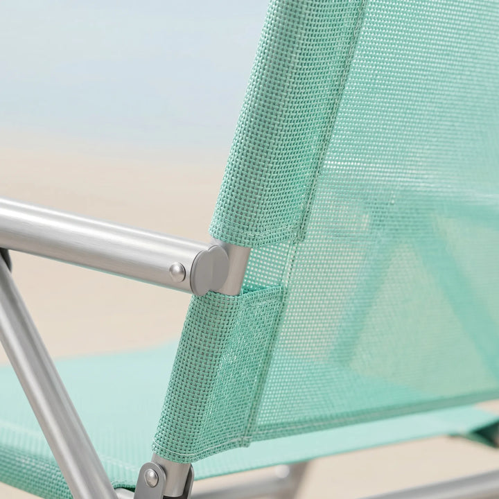 Comfortable portable beach chair for ultimate outdoor relaxation. Features an adjustable recline for sunbathing.