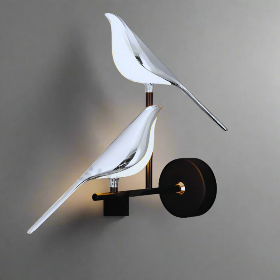Modern rotating LED wall lamp, ideal as a bedroom light; adjustable for task or ambient lighting.