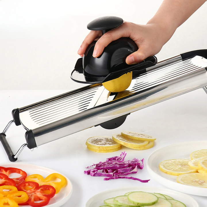 Adjustable stainless steel mandoline slicer for fast, uniform vegetable slicing & food prep.