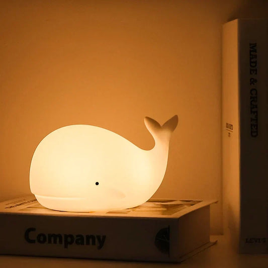 Adorable whale night light for kids, color-changing LED glow. Perfect nursery decor & children's room lamp.