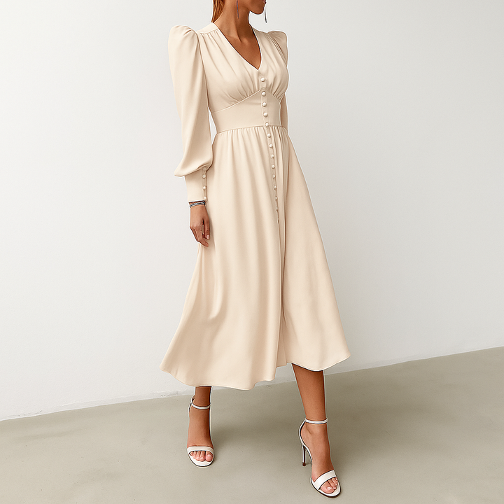 Stylish Amber women's midi dress. Versatile puffed sleeve design, ideal for casual chic or elegant occasions.
