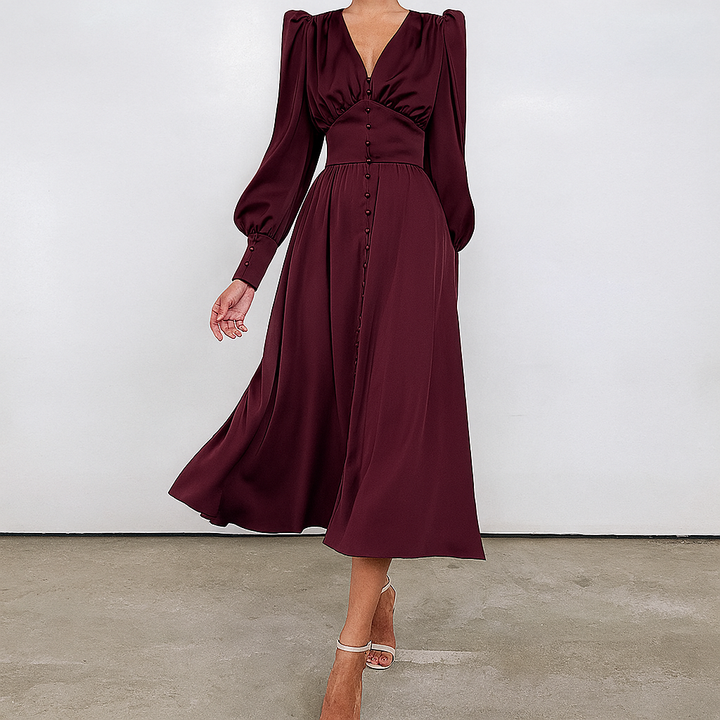 Sophisticated Amber women's long midi dress. Features elegant puffed sleeves, suitable for a fashionable evening.