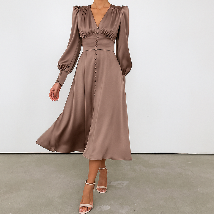 Chic Amber women's dress. A versatile midi length with unique puffed shoulders, offering an elegant silhouette.
