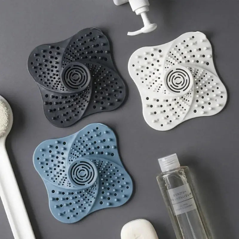 Anti-clog spiral shower drain hair catcher. Prevents blockages in bathroom sinks & tubs. Reusable TPR protector.