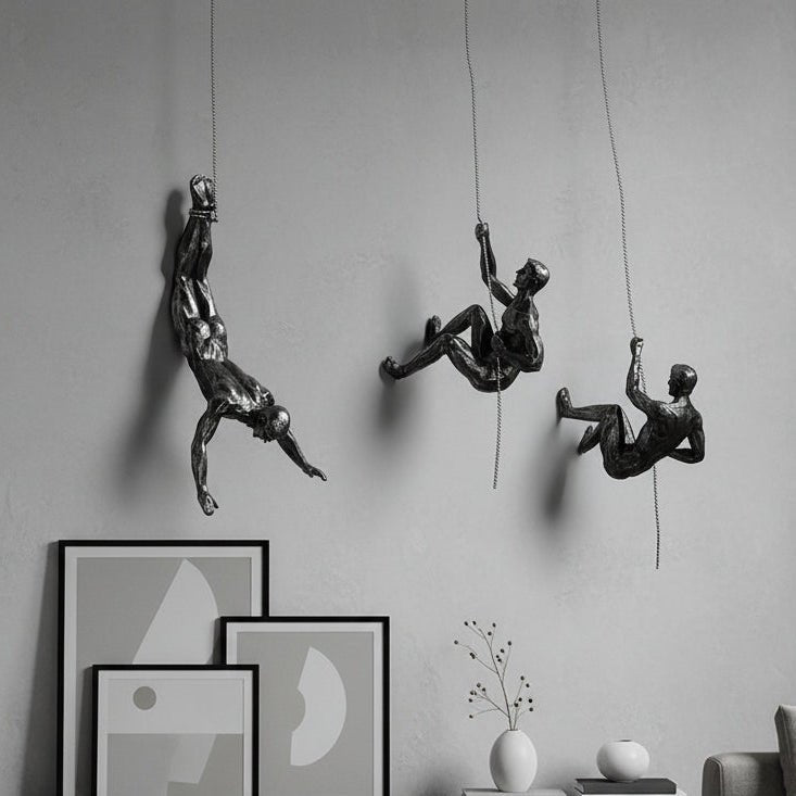Artistic climber figure wall sculpture, perfect for modern home decor & office.