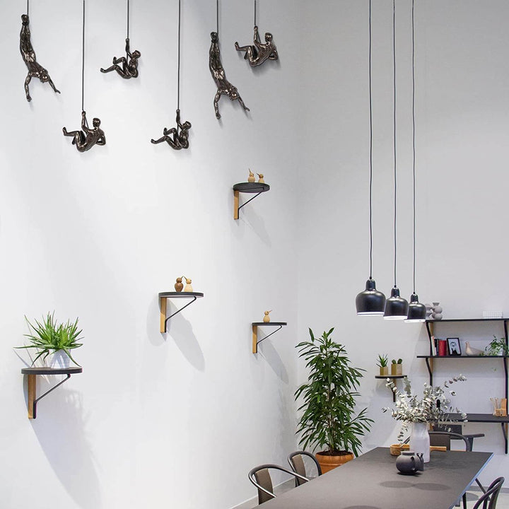 Artistic home decor: Climber figure wall sculpture, unique interior decoration.