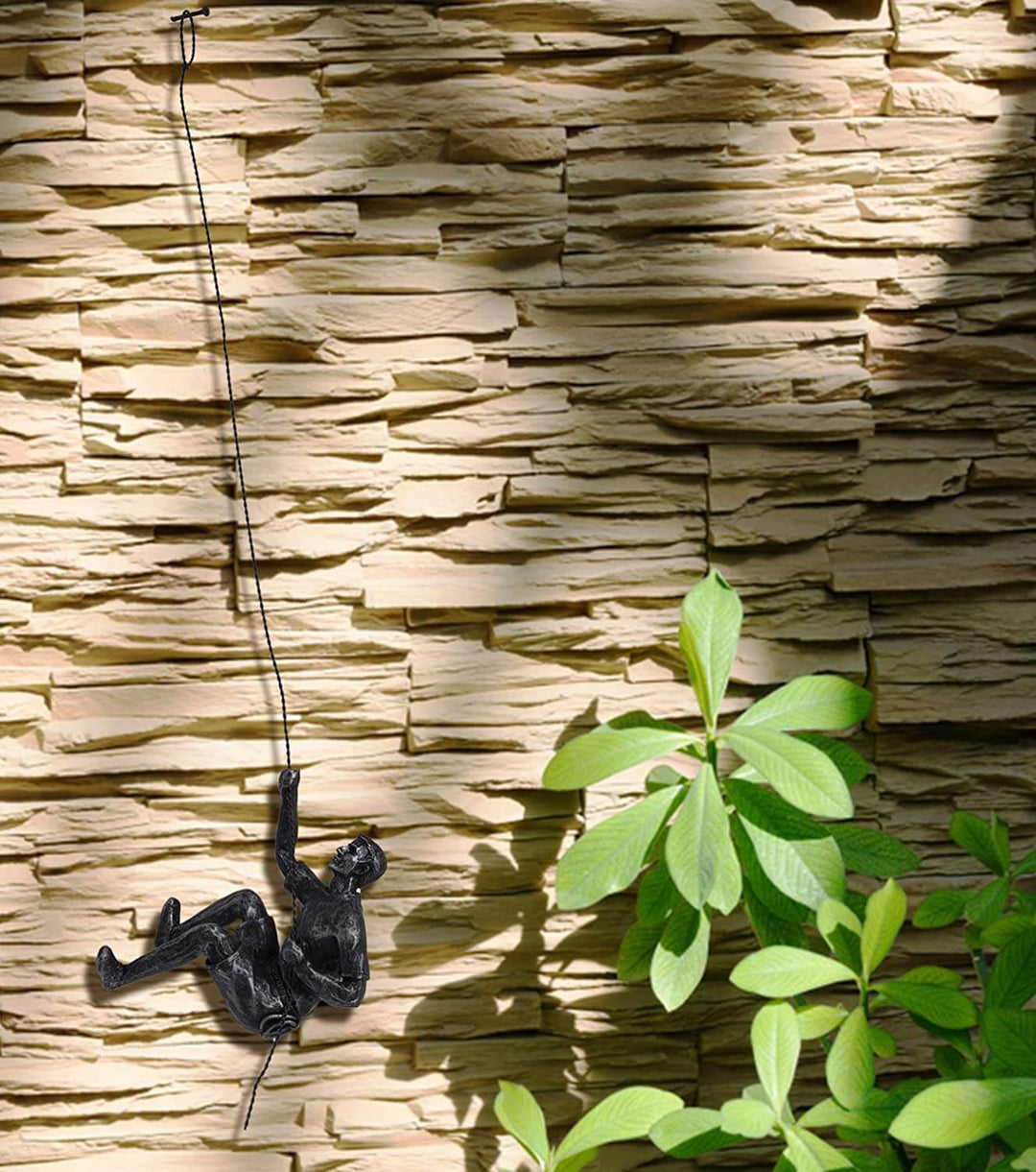 Abstract climbing man sculpture, modern wall accent for a sophisticated space.