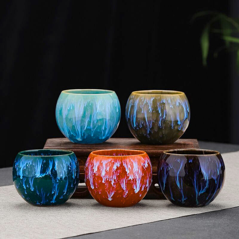 Close-up of a unique Dragon Egg porcelain teacup with intricate Asian-inspired patterns, perfect for oriental decor.