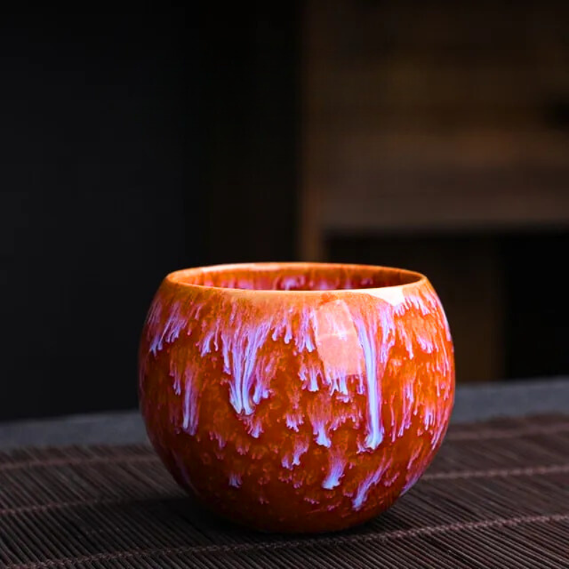 Elegant Asian-inspired Dragon Egg porcelain teacup on a table, perfect for a relaxing tea ceremony or home kitchen decor.