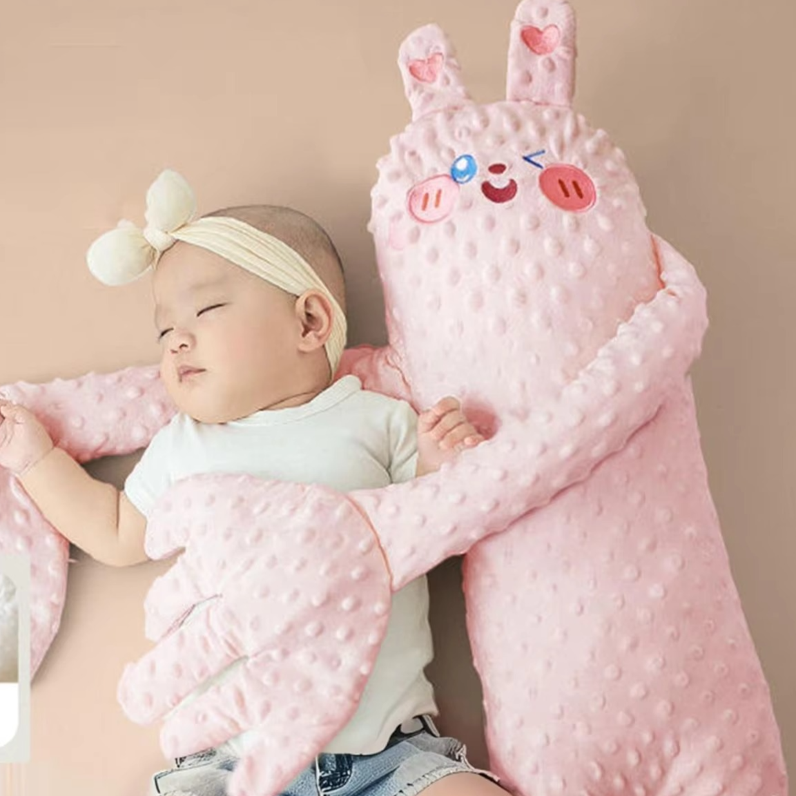 Soft patting pillow comforter providing automatic soothing comfort for babies, promoting calm infant sleep.
