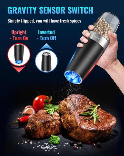 Sleek stainless steel electric salt and pepper grinder set, automatic gravity-activated for fresh seasoning.