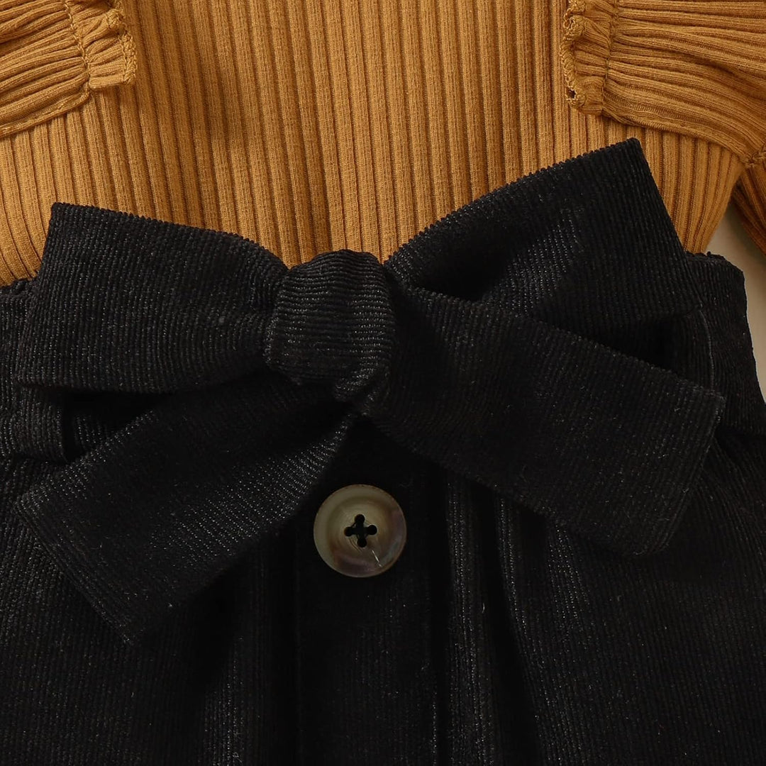 Picture-perfect baby girl's holiday wear: knitted turtleneck and dress combo.