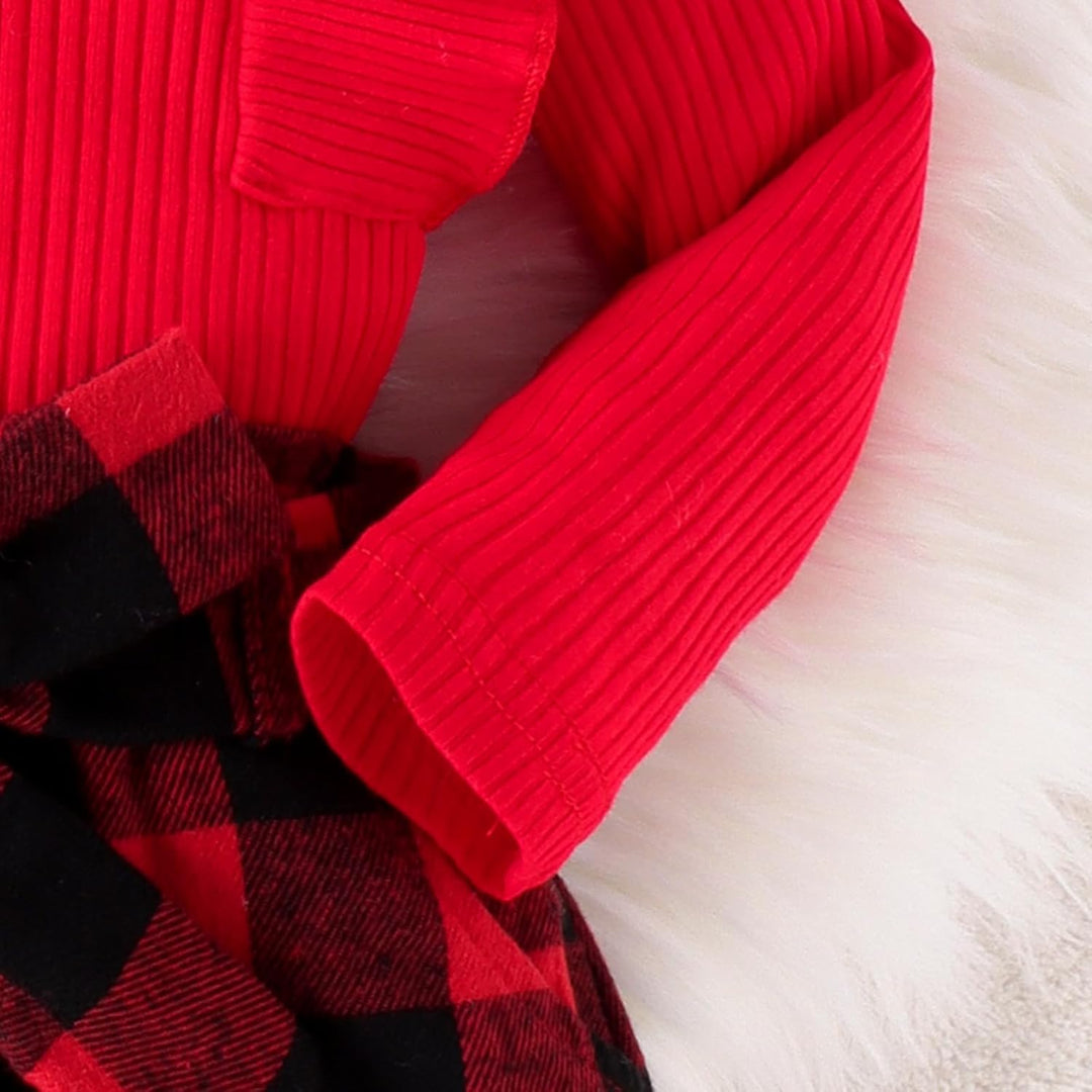 Baby girl's enchanting knitted turtleneck and dress set, cozy and charming.