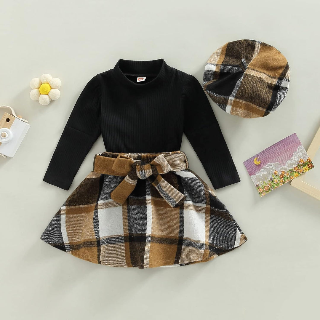 Baby girl's ideal winter ensemble: knitted turtleneck top and a matching dress.