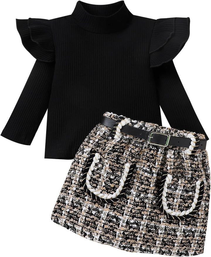 Baby girl's winter essential: a soft knitted turtleneck and a beautiful dress.