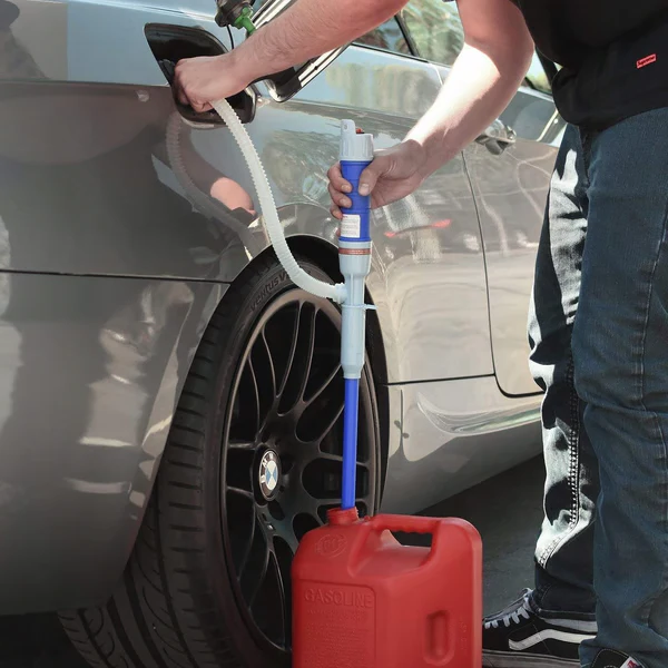 Battery-powered electric siphon pump for easy fuel, gas, water, and diesel liquid transfer. Portable utility tool.