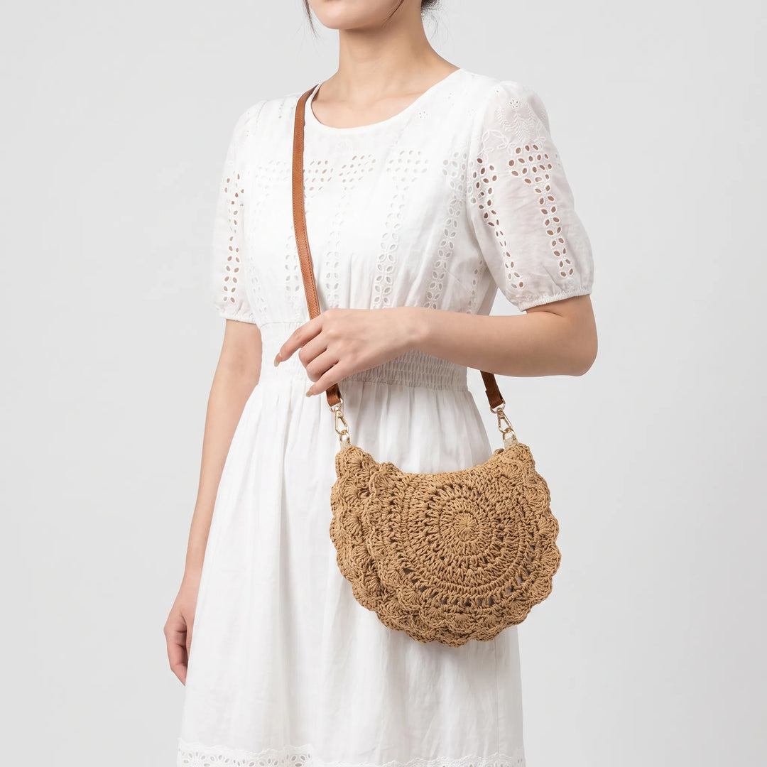 Women's woven crossbody bag with scalloped flap. Casual beige textured shoulder bag, vintage style for everyday carry.