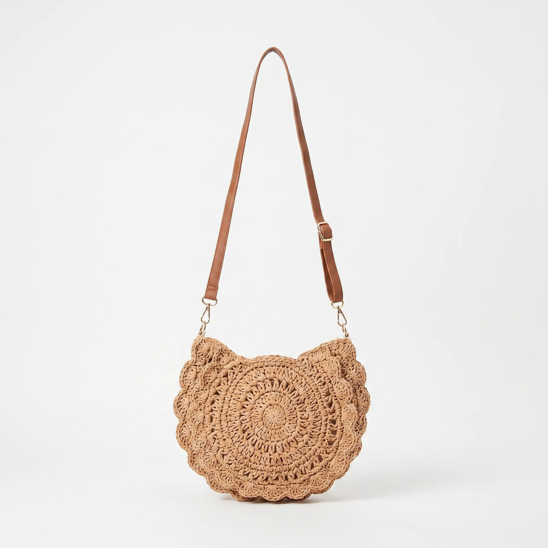 Beige woven crossbody bag for women, featuring a decorative scalloped flap. Casual, textured handbag for daily use.