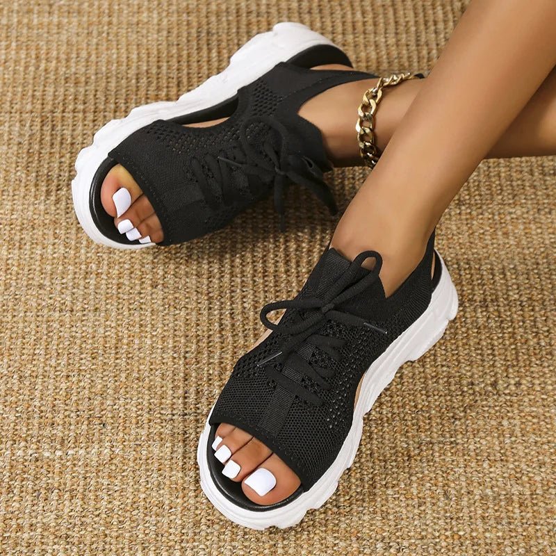 Black women's orthopedic platform sandals, comfortable lace-up design with open toe for everyday wear.