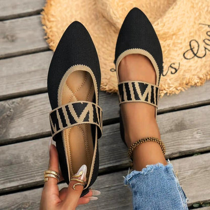 Gray women's orthopedic flats, designed for all-day comfort, foot support, & easy slip-on wear.