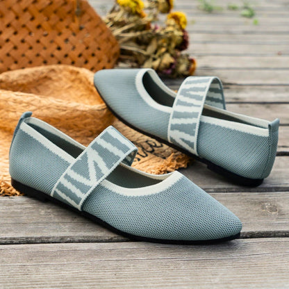 Women's casual beige flats with foot support, ideal for everyday wear & comfortable walking.