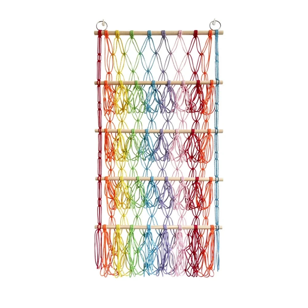 Berry blue toy hammock net, great for nursery decor and storing children's plush toys. Wall storage solution.