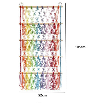 Berry blue toy storage net hammock for kids' rooms. Creates a clutter-free playroom by storing toys on the wall.