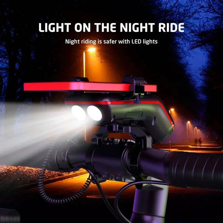 Cycling gear showing a bike light, integrated Bluetooth speaker, and phone mount for bicycles