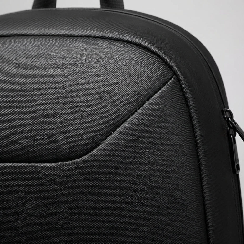 Secure black laptop backpack for daily commute & college. Anti-theft design protects electronics & valuables on the go.