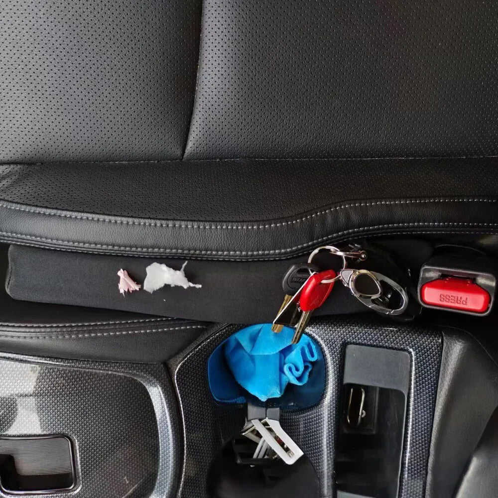 Spill-proof car seat gap filler organizers, a 2-piece set for vehicle interiors. Essential auto accessory.