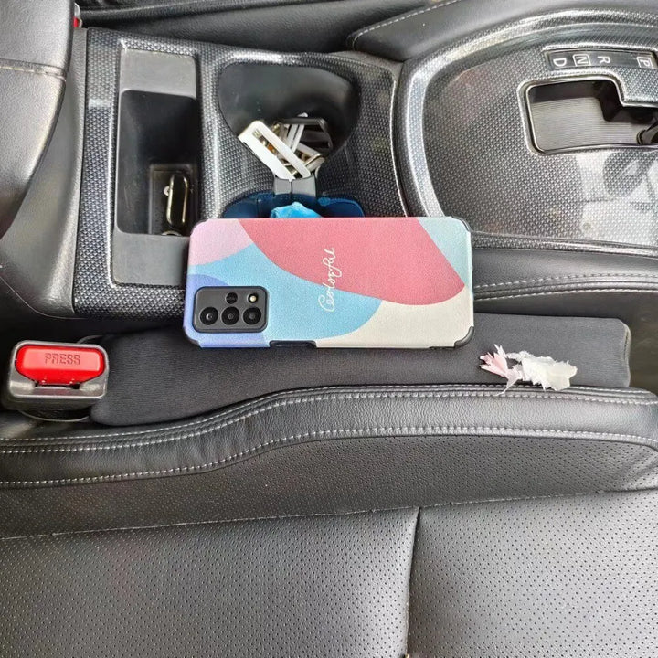 2-piece black leatherette car seat gap filler & storage organizers. Perfect auto accessories for a tidy car.