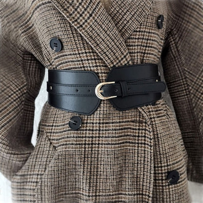Black faux leather wide waist belt for women, perfect for dresses & tunics.