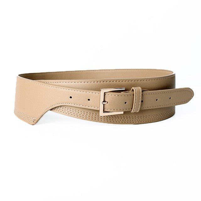 Golden women's wide fashion belt, a chic accessory for dresses and tunics.