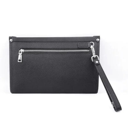Professional man holding a black genuine leather business clutch with fingerprint lock, showcasing sleek design.
