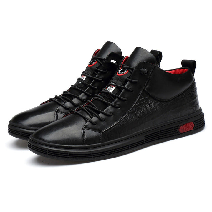 Modern men's black high-top sneakers, red accents, blending fashion with casual comfort & urban appeal.