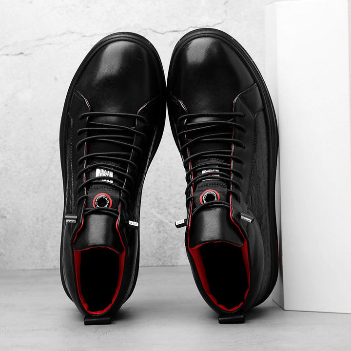 Casual men's black athletic high-top sneakers with vibrant red accents for urban wear.