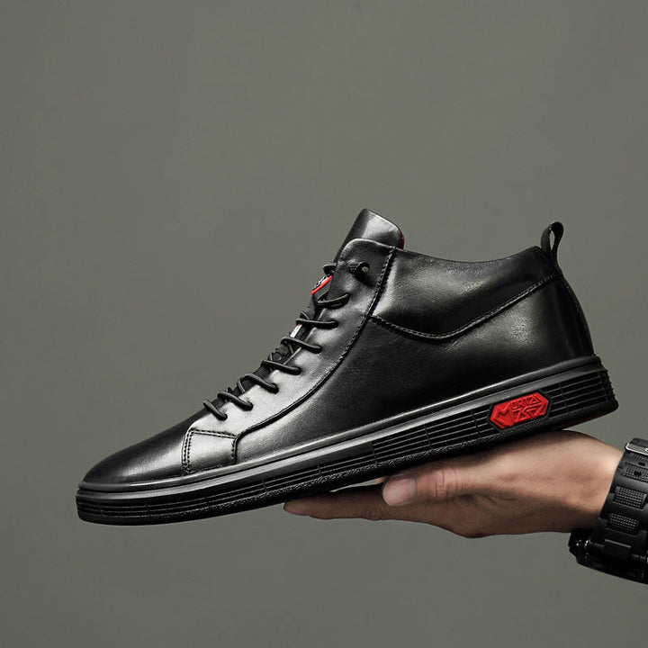 Urban men's black high-top fashion sneakers featuring striking red accents & comfort.