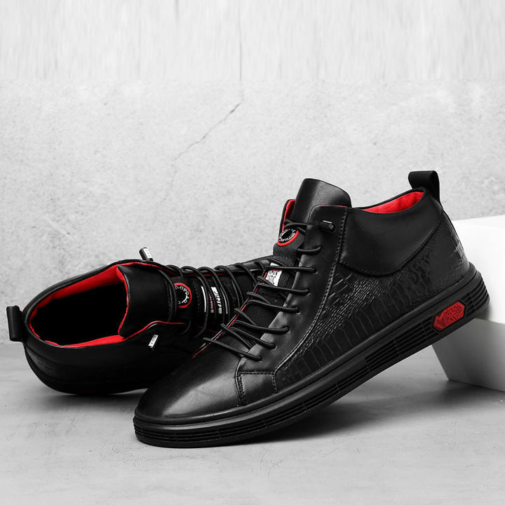 Versatile men's black high-top sneakers with red accents, ideal for casual & fashion outfits.